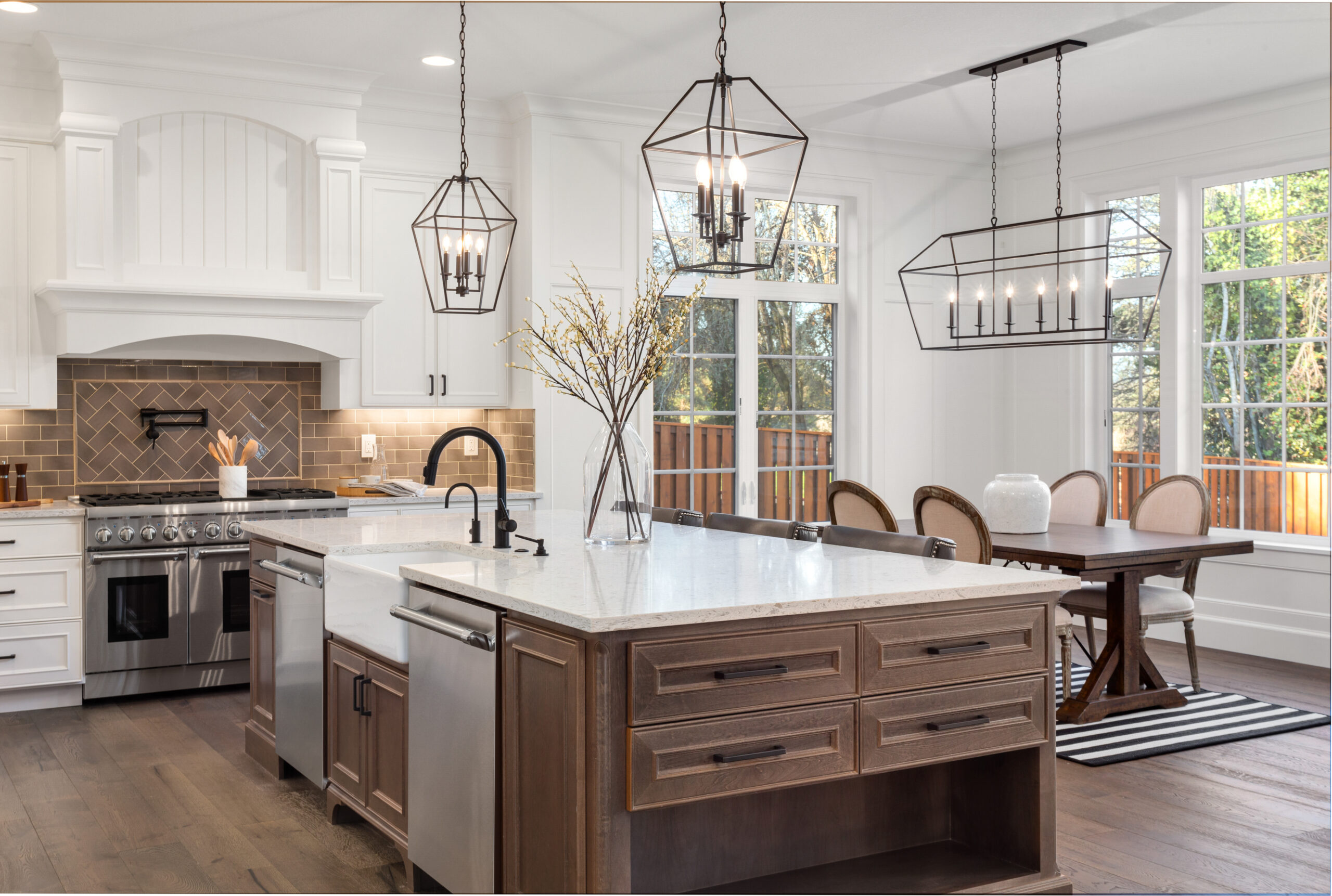Beautiful kitchen in new traditional style luxury home, with qua